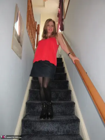 Lily May – European Blonde MILF with Big Tits Spreads Her Pussy on the Stairs