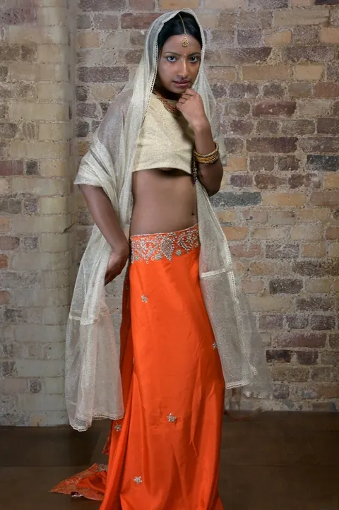 Indian Brunette with Tattoos Reveals Her Body in a Skirt – photo 6 of 15