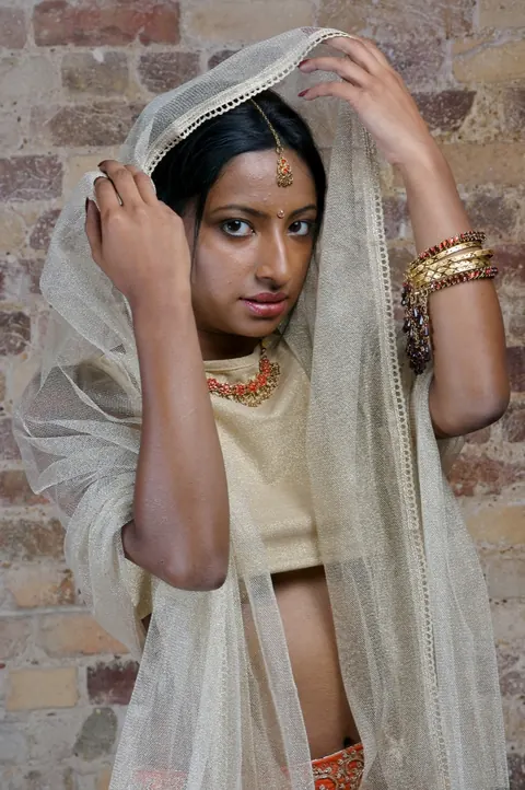 Indian Brunette with Tattoos Reveals Her Body in a Skirt – photo 7 of 15