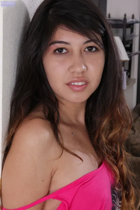 Lucy James: Brunette with Enhanced Tits Strips Nude and Poses for the Camera – photo 2 of 21