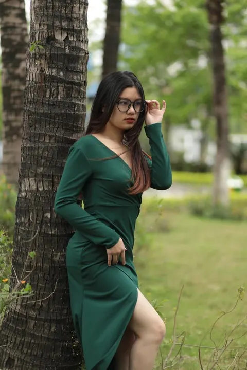Petite Asian Brunette Poses in a Dress and Glasses Outdoors – photo 14 of 21