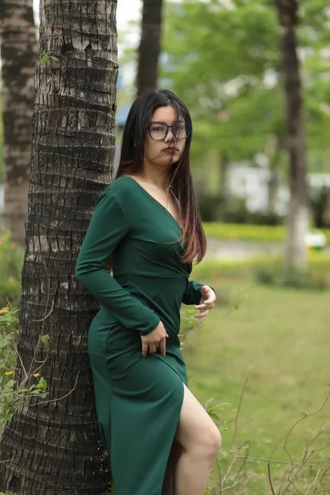 Petite Asian Brunette Poses in a Dress and Glasses Outdoors – photo 13 of 21