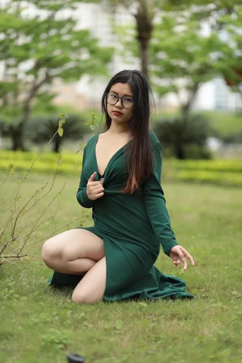 Petite Asian Brunette Poses in a Dress and Glasses Outdoors – photo 7 of 21