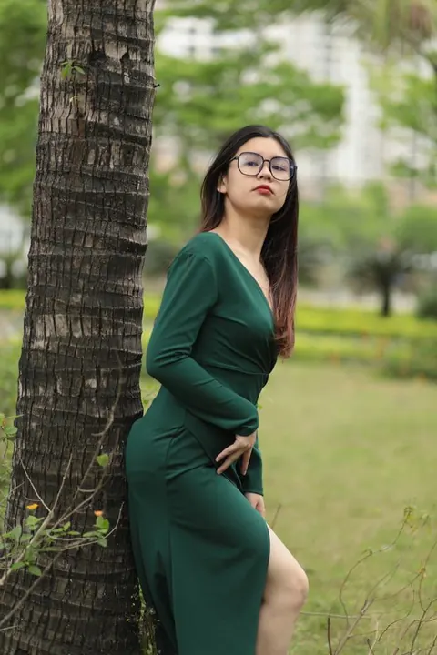 Petite Asian Brunette Poses in a Dress and Glasses Outdoors – photo 17 of 21