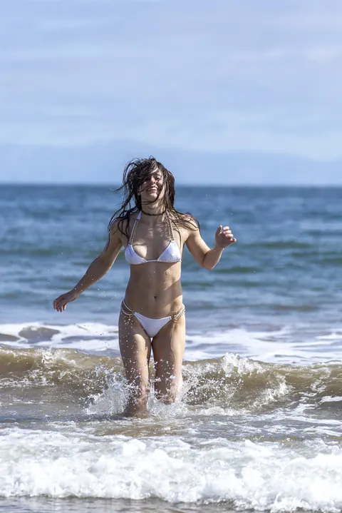 Abbie Maley: Athletic Brunette PAWG Poses in a Bikini and Shorts on the Beach – photo 14 of 18