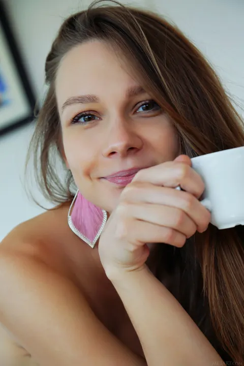 Skinny Woman in Socks Strips and Spreads While Drinking Coffee – photo 17 of 21
