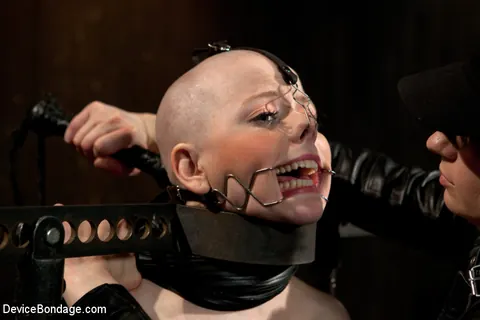 Alani Pi & Coral Aorta: Tall Blonde in Bondage Wears Mouth Spreader – photo 8 of 11