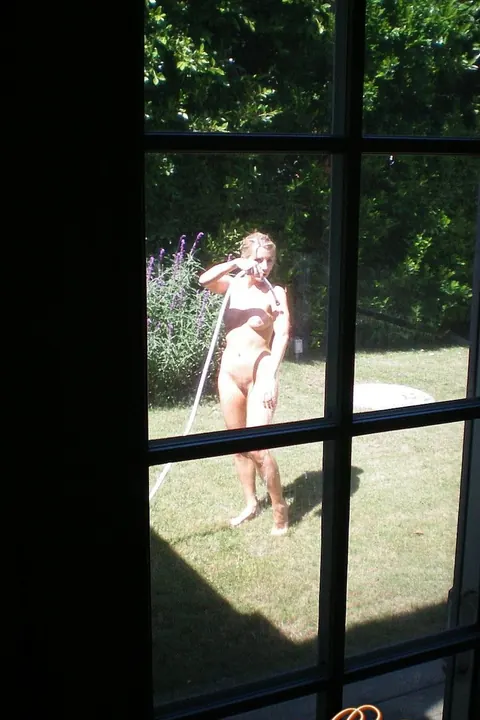 Ashley Fires: Blonde MILF Uses Garden Hose for Lesbian Fun in a Bikini – photo 1 of 17