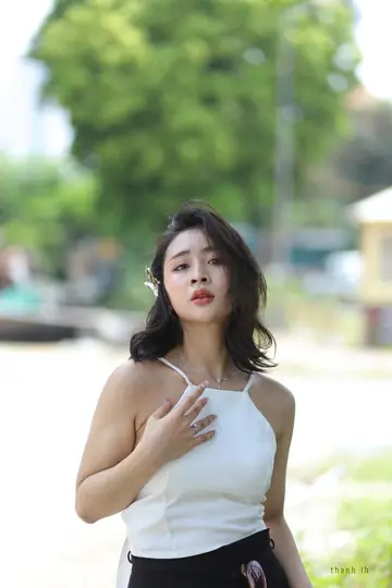 Woman Strips Naked and Turns to Show Front and Back