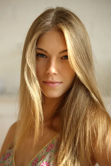 Slim European Blonde Strips Naked and Spreads Her Legs Wide