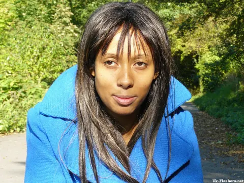 Ebony Babe with Big Tits Fingers Her Hairy Pussy on a Roadway – photo 7 of 16