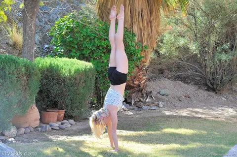 Blonde in Shorts Spreads Her Legs Outdoors – photo 6 of 21