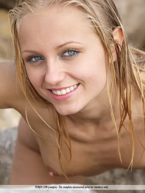 Slim Blonde European Strips Off Her Bikini on Seaside Rocks – photo 14 of 16
