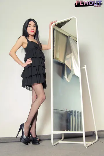 Trans Woman Undresses from a Dress, Posing in Stockings and Heels