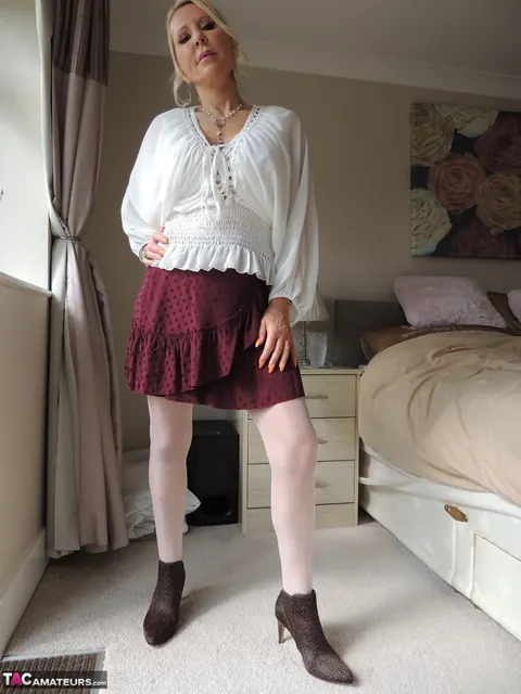 Blonde MILF Strips Off Her Skirt and Spreads Her Legs in Lingerie – photo 2 of 12