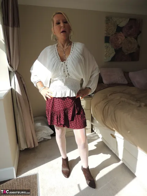 Blonde MILF Strips Off Her Skirt and Spreads Her Legs in Lingerie – photo 1 of 12