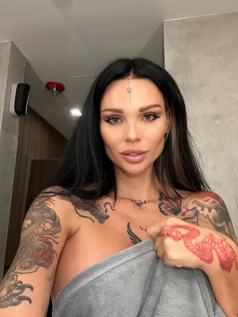 Brunette with Big Tits and a Round Ass Shows Off Her Tattoos – photo 2 of 13