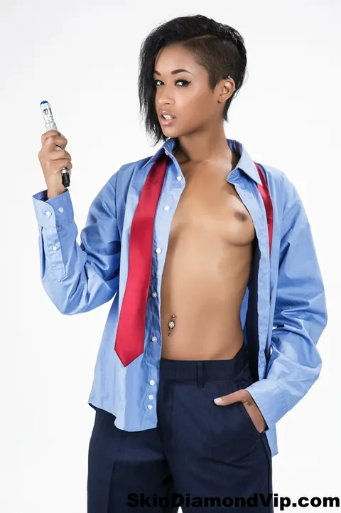 Skin Diamond: Ebony Brunette with Small Natural Tits Shows Off Her Tattoos – photo 8 of 15