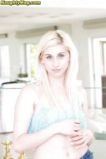 Nollie Roxx – Petite Blonde Slips Off Her Panties and Fingers Her Shaved Pussy