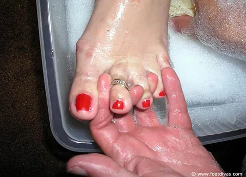 Woman in Lingerie and Heels Dominates with Her Feet – photo 7 of 11