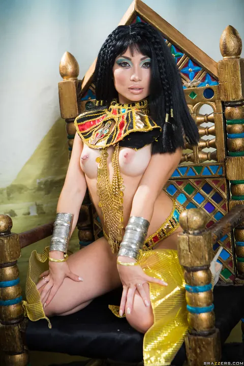 Rina Ellis: Petite Korean in Costume and Heels Flashes Her Big Tits – photo 20 of 21