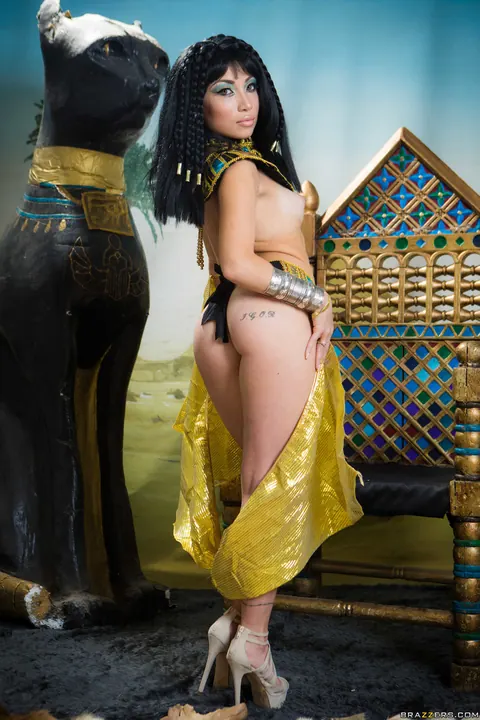 Rina Ellis: Petite Korean in Costume and Heels Flashes Her Big Tits – photo 17 of 21