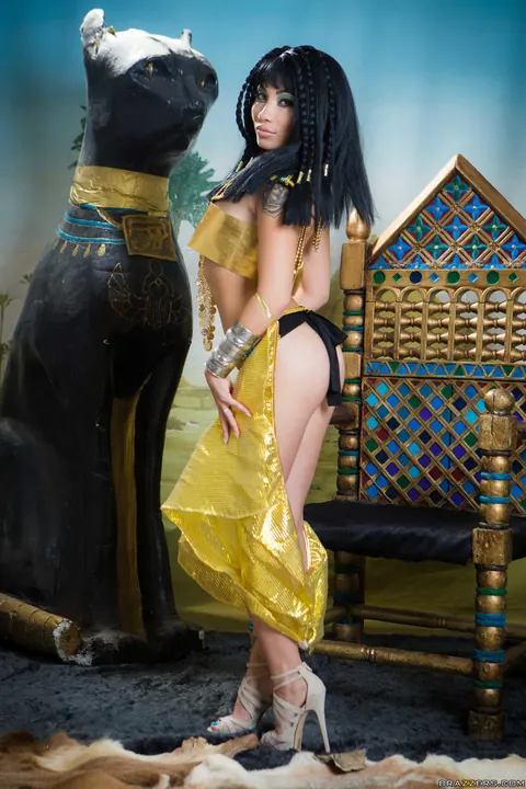Rina Ellis: Petite Korean in Costume and Heels Flashes Her Big Tits – photo 3 of 21
