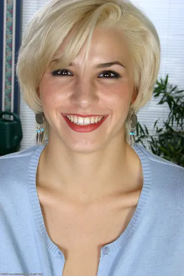 Slim Short-Haired Blonde Undresses Outdoors Showing Her Hairy Pussy