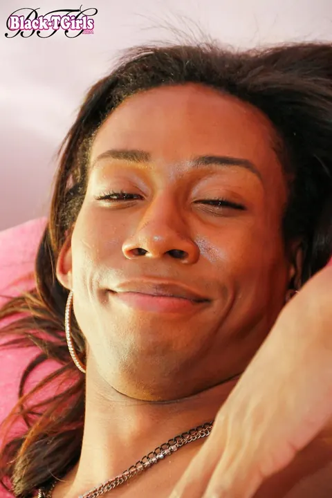 Ebony Trans Woman Strips Nude and Flaunts Her Cock and Ass – photo 16 of 16