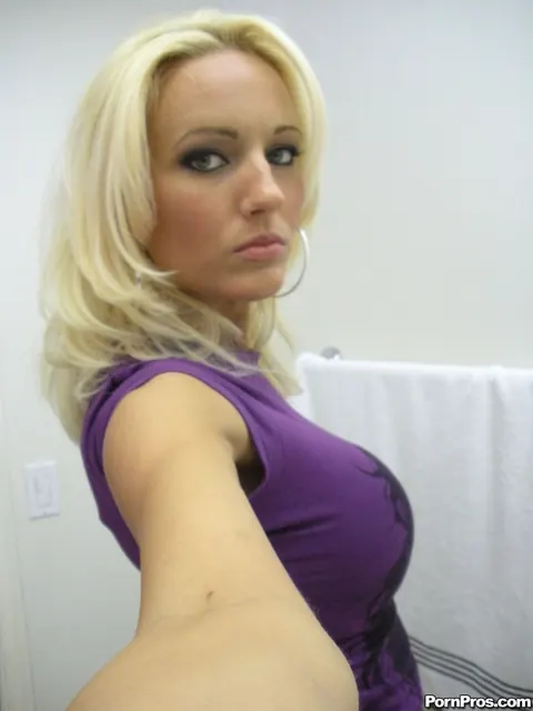 Cody Love: Blonde with Big Enhanced Tits Snaps Nude Selfies on Phone – photo 2 of 17
