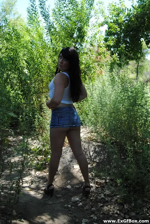 Black-Haired Woman Flashes Her Ass in a Skirt and Shorts – photo 4 of 21