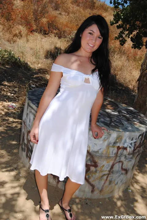 Black-Haired Woman Flashes Her Ass in a Skirt and Shorts – photo 21 of 21