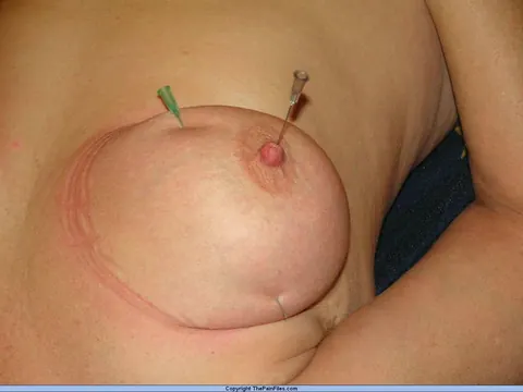 Mature Blonde Undresses and Shows Off Her Pierced Nipples – photo 12 of 12