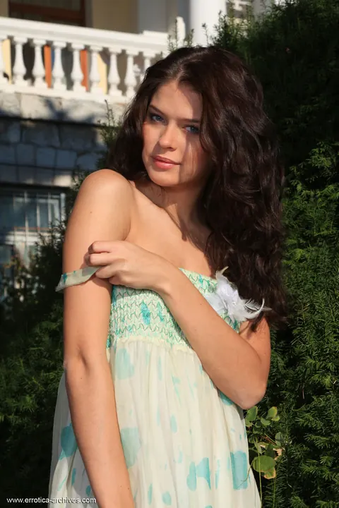 Brunette Strips Off Her Skirt on a Garden Path – photo 1 of 16