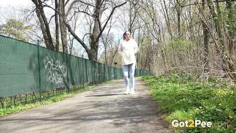 European Blonde Pulls Down Her Jeans to Pee Outdoors – photo 2 of 15