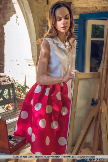 Brunette Strips Out of Her Skirt on the Patio