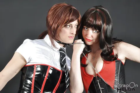 Busty Brunette Trans Woman Poses in a Latex Skirt and Boots – photo 7 of 16