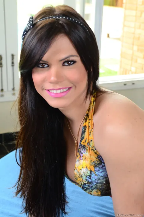 Latina Trans Woman in Fishnet Shows Her Enhanced Tits and Erection – photo 4 of 17