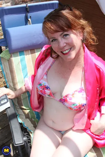 European Redhead MILF Fingers Her Pussy Outdoors on a Blanket