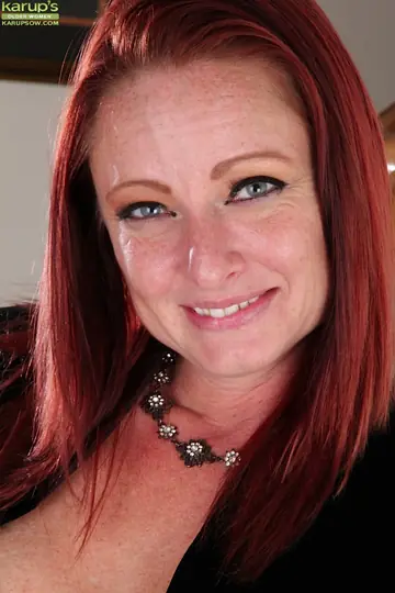Mature Redhead in Stockings and Heels Spreads Her Hairy Pussy