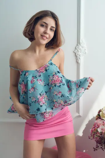 Short-Haired Brunette Strips and Spreads Her Pussy
