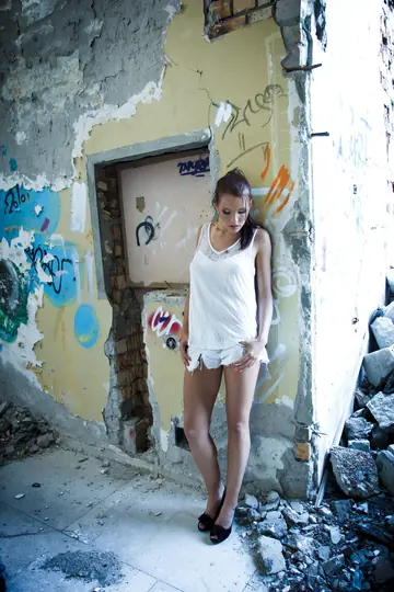 Slim Brunette with Big Natural Tits Strips Out of Her Shorts in High Heels