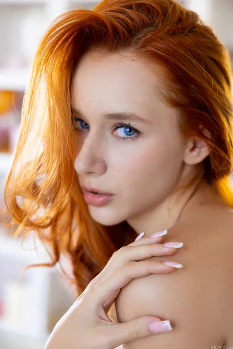 Redhead Pulls Her Top Down and Spreads Her Legs Wide – photo 6 of 21