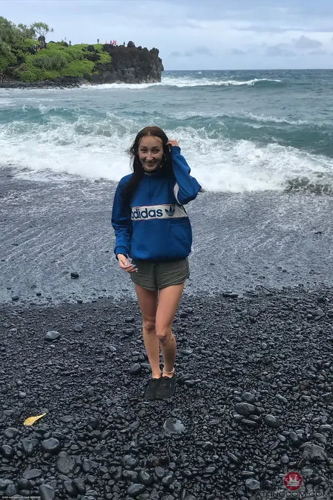 Carmen Rae: Slim Brunette in a Bikini and Glasses Strips on the Beach – photo 12 of 21