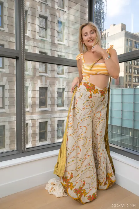 Busty Blonde Strips Out of Her Lingerie by the Condo Window – photo 5 of 16