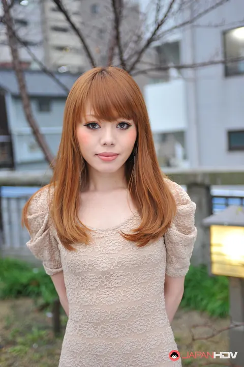 Japanese Redhead Flashes Her Legs in a Short Dress Outdoors – photo 1 of 15