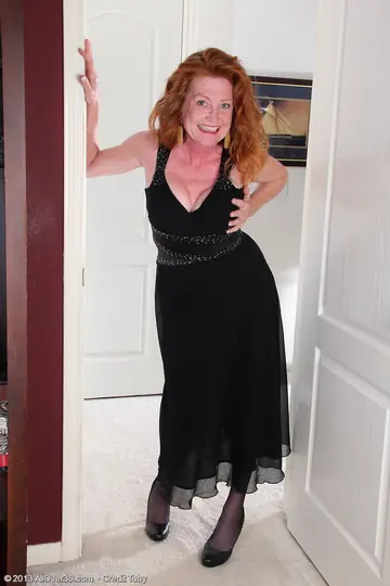 Mature Redhead MILF Strips Out of Her Lingerie and Spreads Her Shaved Pussy