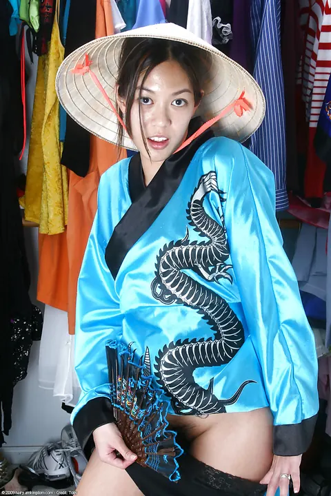 Asian Woman Reveals Her Hairy Pussy Under a Kimono Robe – photo 2 of 16
