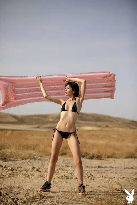 Slim Short-Haired Woman Strips Out of Her Bikini Outdoors – photo 6 of 21