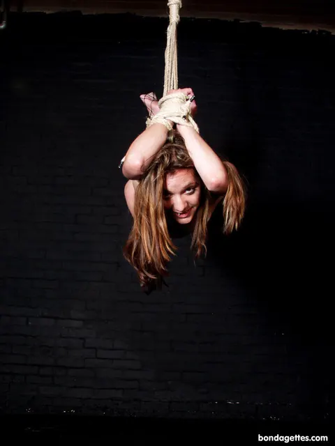 Brunette Kneels Bound in Rope Bondage and Poses Nude – photo 21 of 21